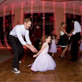 Groom and Flower Girl at Hagerty Center by Traverse City Wedding Photographer Thomas Kachadurian