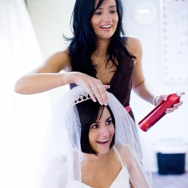 Brides sister doing her hair by Traverse City Wedding Photographer Thomas Kachadurian