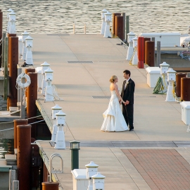 Wedding couple on the dock at Bay Harbor by Traverse City Wedding Photographer Thomas Kachadurian